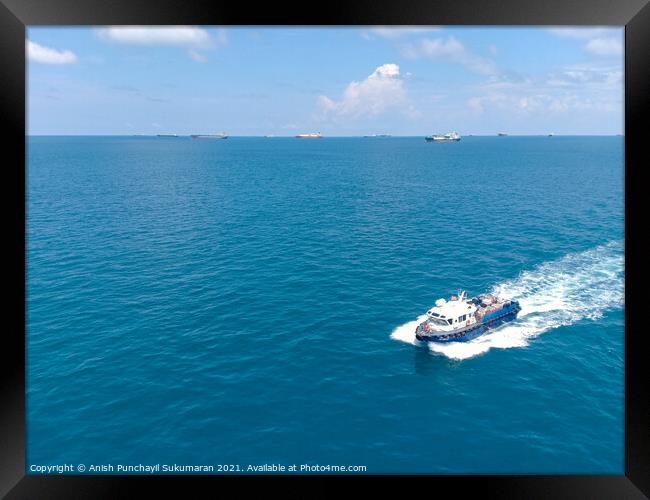 a boat delivering food supplies Framed Print by Anish Punchayil Sukumaran