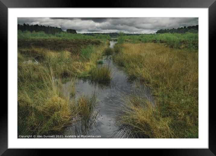 Between storms at Blakemere Moss Framed Mounted Print by Alan Dunnett