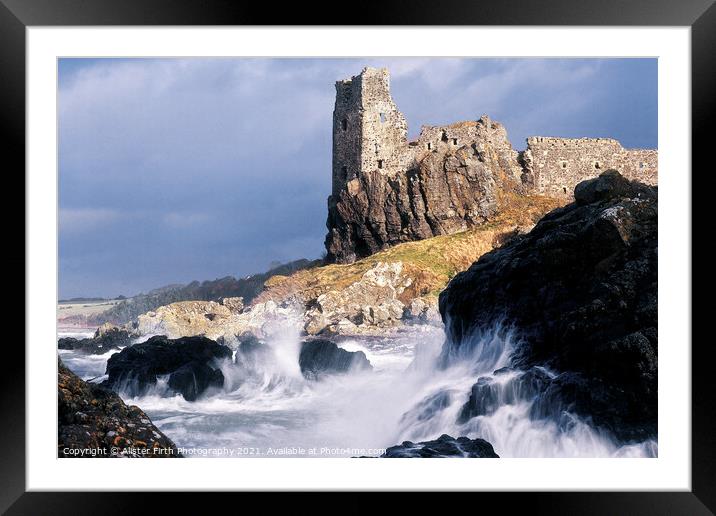 Stormy winter seas break against the rocky shore at Dunure Castle Framed Mounted Print by Alister Firth Photography