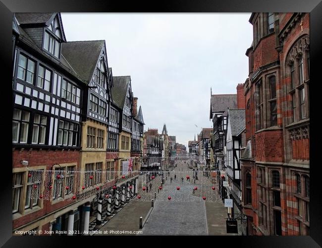 Almost deserted street in Chester on Christmas Day Framed Print by Joan Rosie