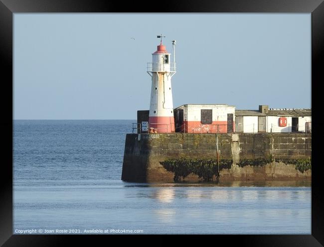 Newlyn lighthouse on a clear day Framed Print by Joan Rosie