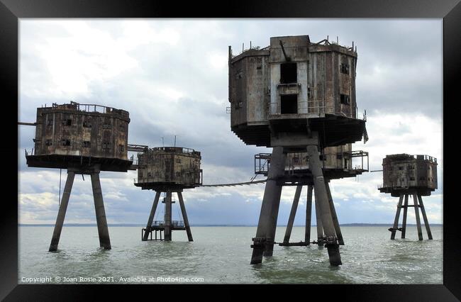 Five rusting Maunsell Forts in the Thames Estuary near Whitstable Framed Print by Joan Rosie