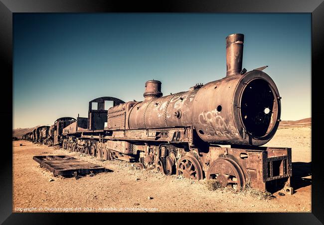 Old rusty train cemetery in Uyuni, Bolivia Framed Print by Delphimages Art
