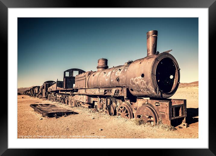 Old rusty train cemetery in Uyuni, Bolivia Framed Mounted Print by Delphimages Art