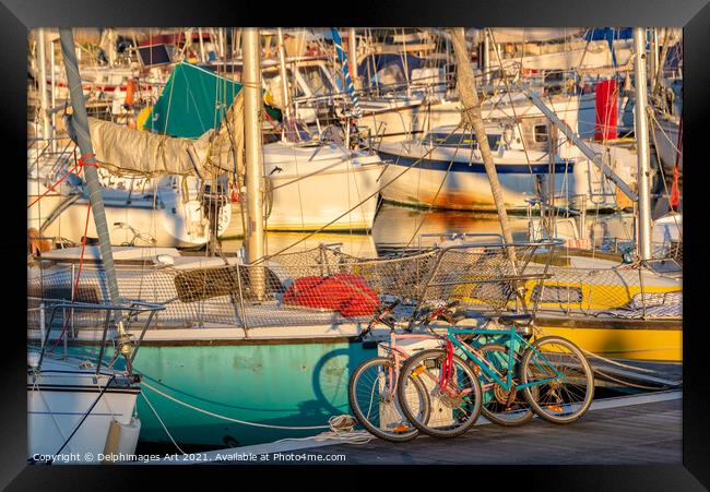 Cycling and sailing. Colourful bicycles and boats Framed Print by Delphimages Art