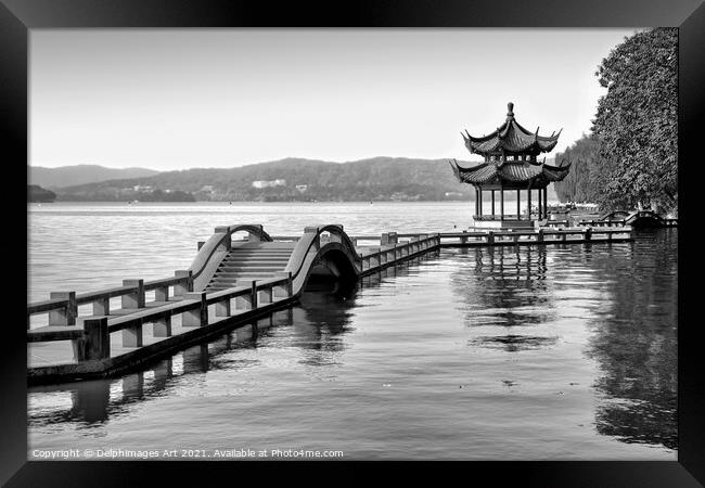 Chinese bridge on Hangzhou lake, China Framed Print by Delphimages Art