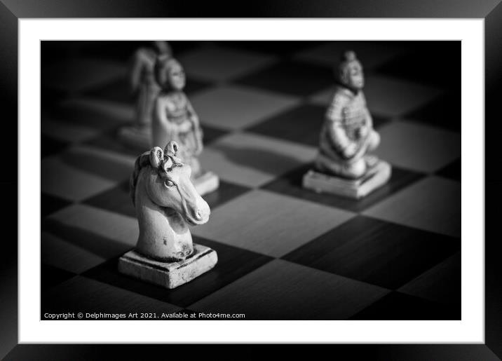 Chess. White knight on a chinese chess game  Framed Mounted Print by Delphimages Art