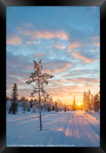 Snowy landscape at sunset in winter, Finland Framed Print by Delphimages Art