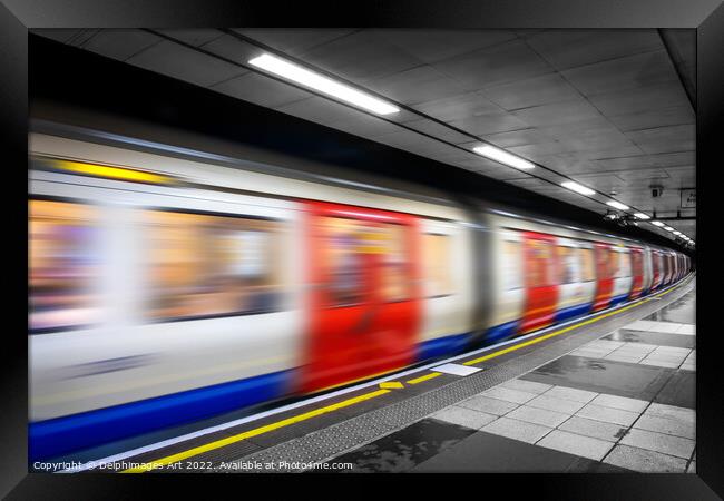 London tube train in an undergroud metro station Framed Print by Delphimages Art