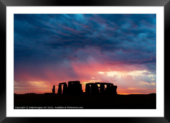 Stonehenge at sunset, dramatic sky Framed Mounted Print by Delphimages Art