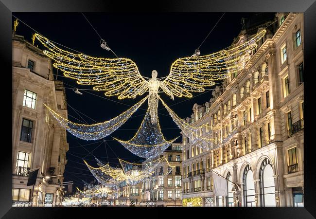 Angels Christmas lights in Regent street, London Framed Print by Delphimages Art