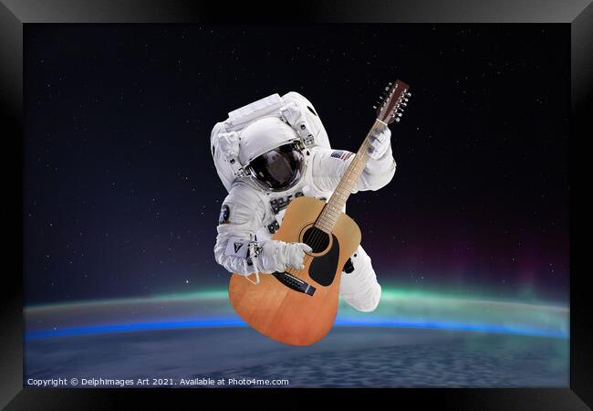 Space guitar, astronaut playing guitar Framed Print by Delphimages Art
