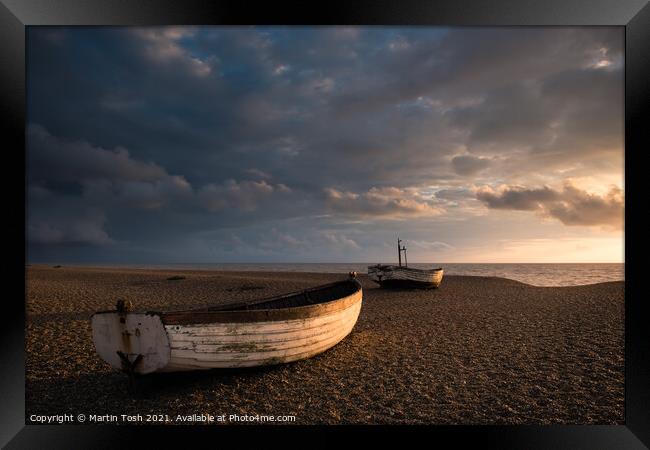 Ready. Old rowing boats on shingle beach Framed Print by Martin Tosh