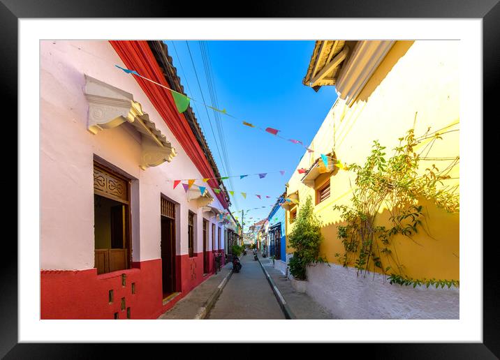 Colombia, Scenic colorful streets of Cartagena in historic Getsemani district near Walled City, Ciudad Amurallada, a UNESCO world heritage site Framed Mounted Print by Elijah Lovkoff