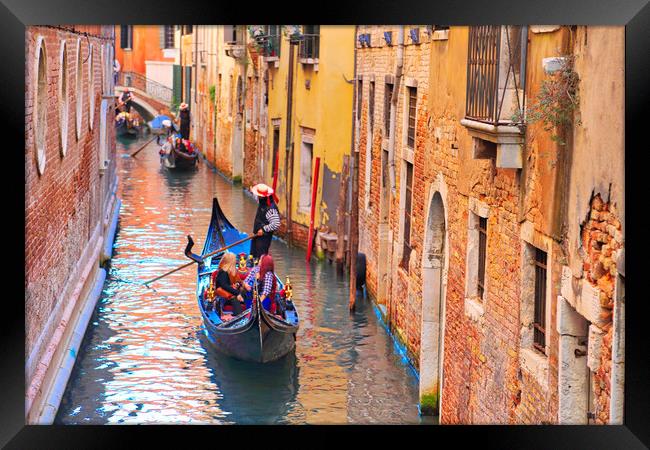 Luxury Gondola waiting for tourists near Rialto Bridge in Venice Framed Print by Elijah Lovkoff