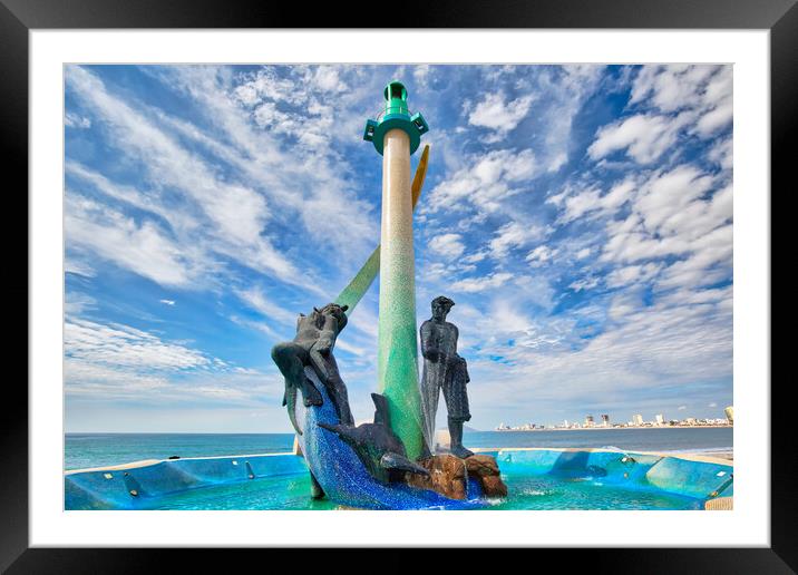 Mazatlan, Mexico, a Fishermen monument (Monumento al Pescador) located on scenic Mazatlan Promenade (Malecon) near the ocean shore and historic city center Framed Mounted Print by Elijah Lovkoff