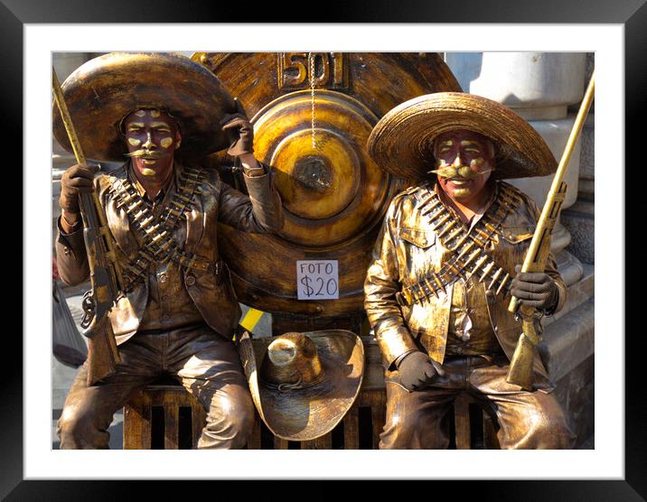 People dressed as bandidos posing at Mexico city streets Framed Mounted Print by Elijah Lovkoff