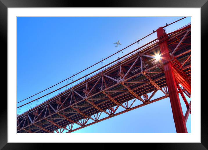 Landmark suspension 25 of April bridge over Tagus River in Lisbon Framed Mounted Print by Elijah Lovkoff