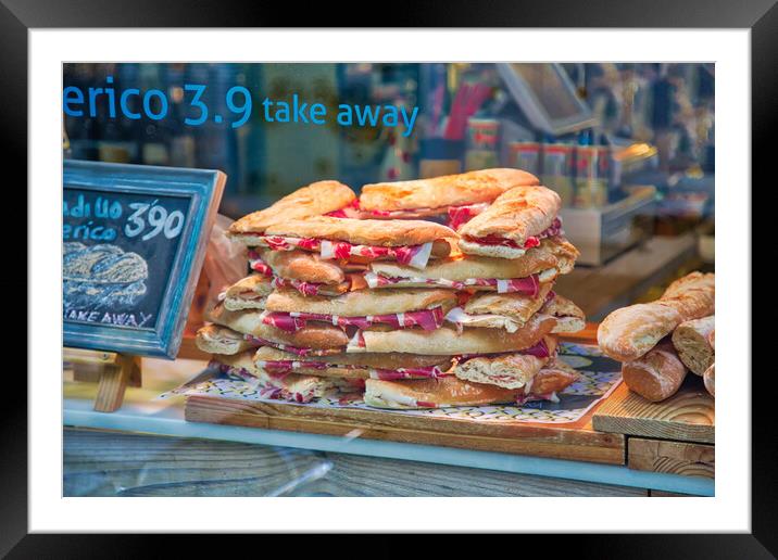 Famous Spanish jamon sandwich sold at the streets of Granada his Framed Mounted Print by Elijah Lovkoff