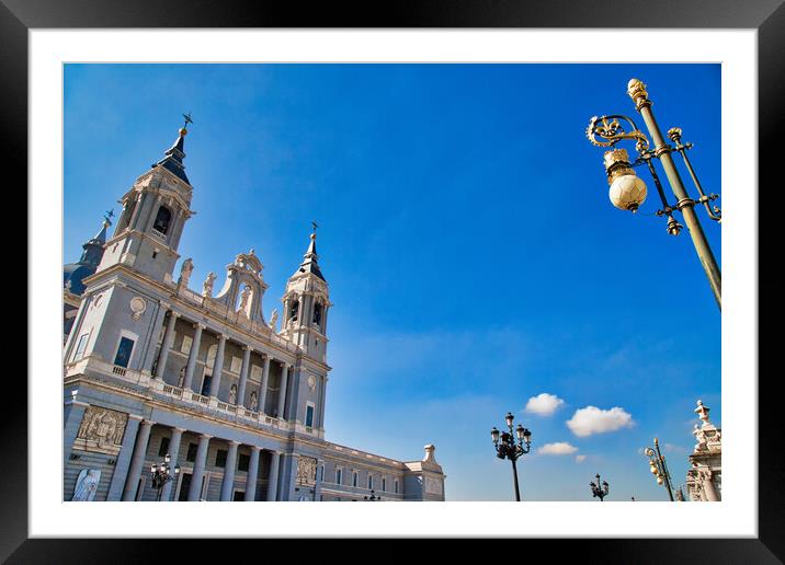 Madrid, Famous Almudena Cathedral on a bright sunny day Framed Mounted Print by Elijah Lovkoff