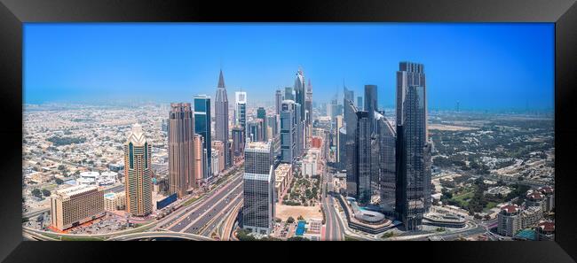 UAE, Dubai downtown financial skyline and business shopping center near Dubai Mall Framed Print by Elijah Lovkoff