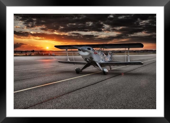 A small airplane sitting on the tarmac of an airpo Framed Mounted Print by maka magnolia