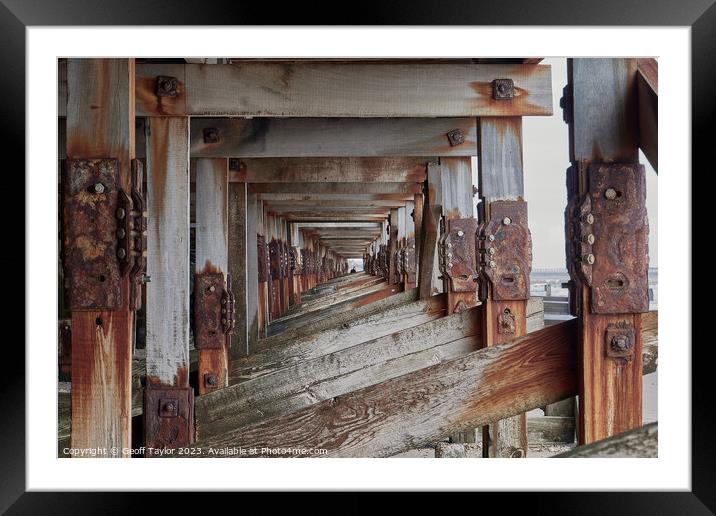 Under the huts Framed Mounted Print by Geoff Taylor