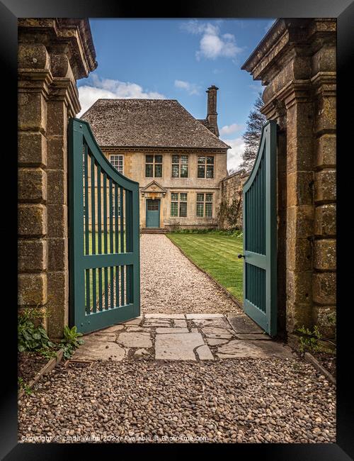 Snowshill Manor - a peek into the garden Framed Print by Linda Webb