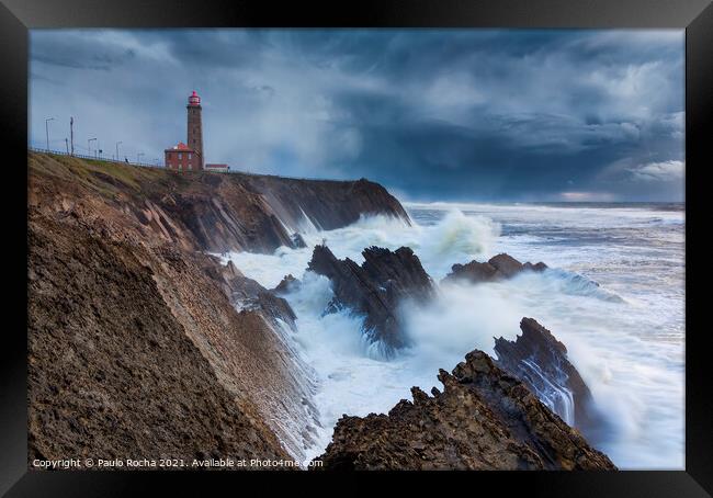 The lighthouse and the storm Framed Print by Paulo Rocha