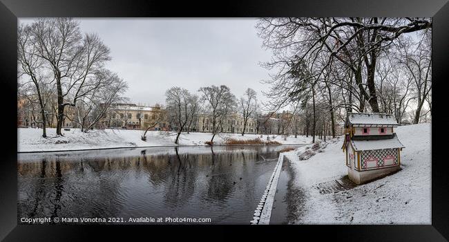 Winter covered in snow park with canal in Riga Framed Print by Maria Vonotna