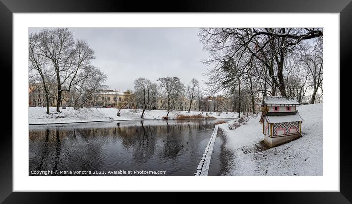 Winter covered in snow park with canal in Riga Framed Mounted Print by Maria Vonotna