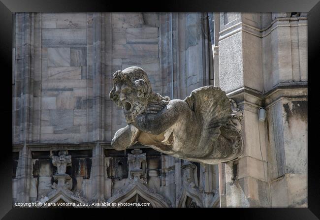 Man gargoyle statue on cathedral Framed Print by Maria Vonotna