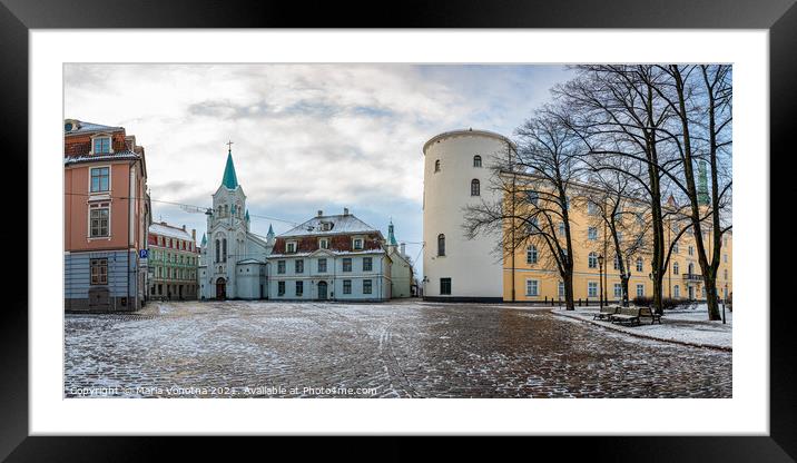 Riga Castle during sunny winter snowy day Framed Mounted Print by Maria Vonotna