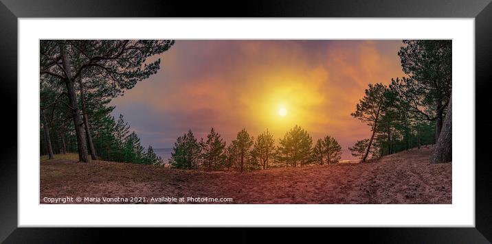 Colorful sunset over sea coast and forest Framed Mounted Print by Maria Vonotna