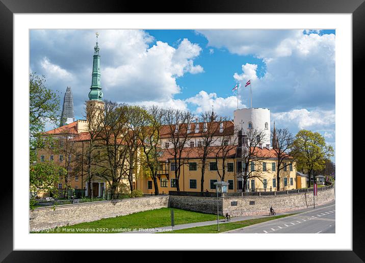Riga Castle during sunny day in Riga, Latvia Framed Mounted Print by Maria Vonotna