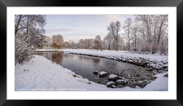 Beautiful small pond with rocks snowy trees Framed Mounted Print by Maria Vonotna