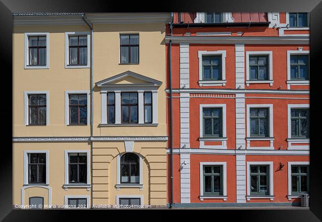 Colorful facade with yellow and red of historic buildings Framed Print by Maria Vonotna