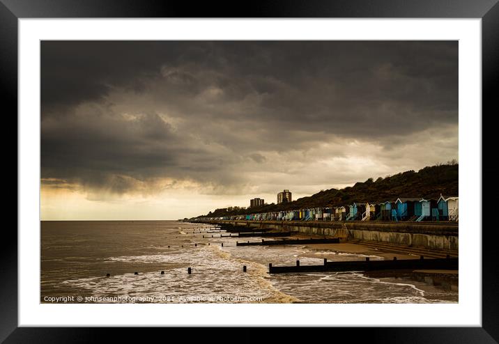 Late afternoon at Frinton on Sea Beach huts Framed Mounted Print by johnseanphotography 