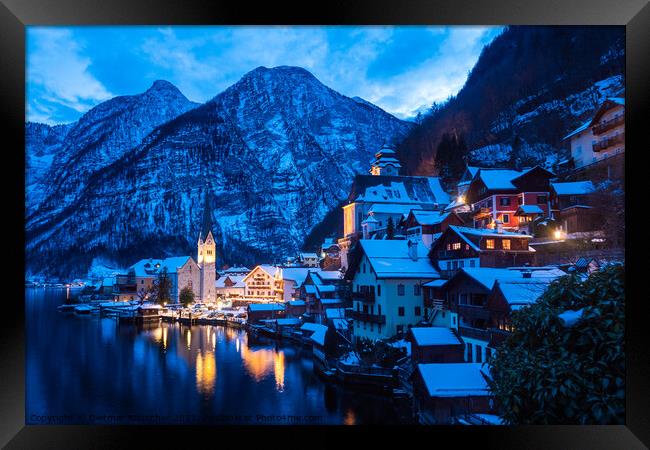 Hallstatt Cityscape on a Winter Evening Covered with Snow Framed Print by Dietmar Rauscher