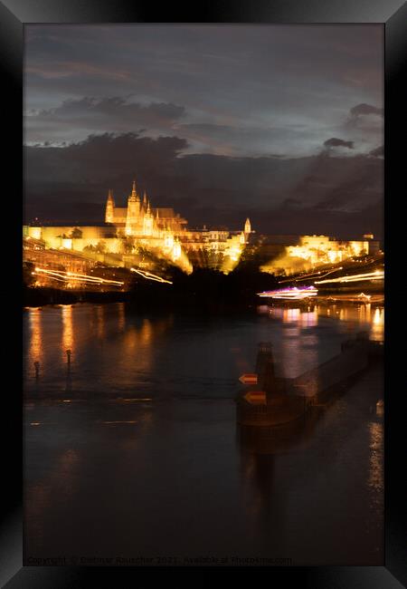 Blurred Cityscape of Prague with River Vltava at Night Framed Print by Dietmar Rauscher
