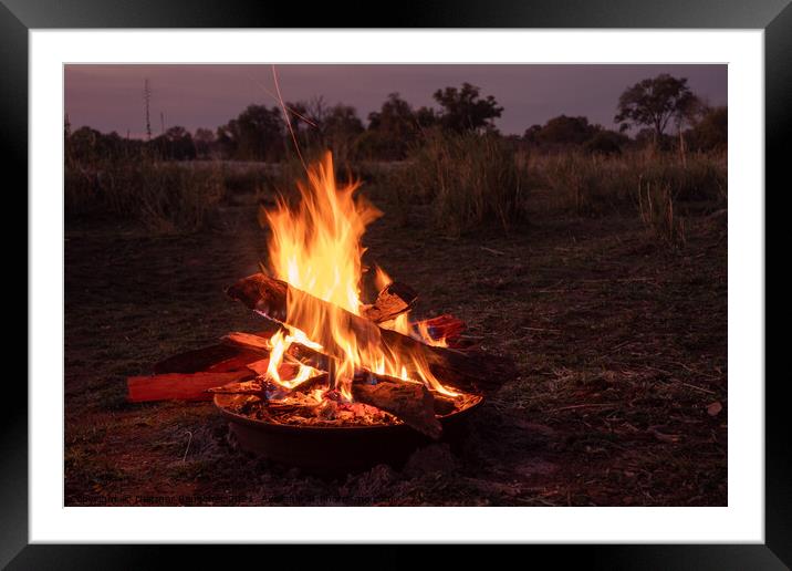 Camp Fire Burning in African Savanna at the Okavango, Africa Framed Mounted Print by Dietmar Rauscher