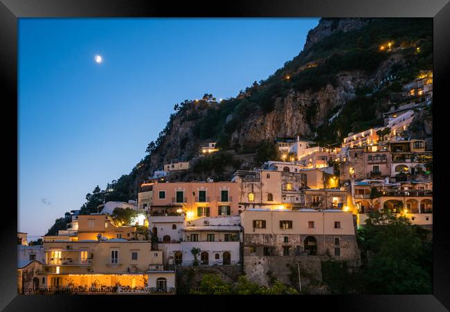 Positano Houses in the Evening Illuminated Framed Print by Dietmar Rauscher