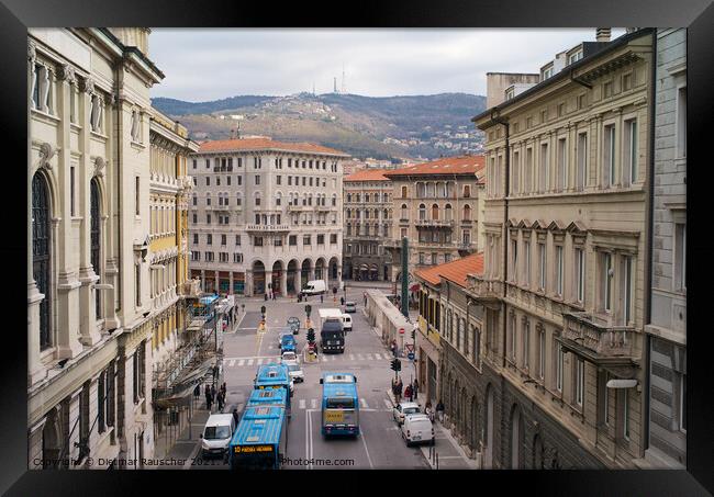 Traffic on the Piazza Goldoni in Trieste, Italy Framed Print by Dietmar Rauscher