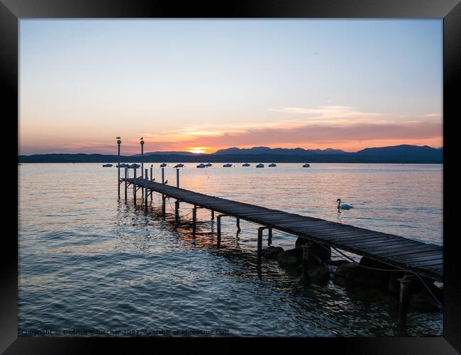 Lake Garda Jetty at Sunset Framed Print by Dietmar Rauscher