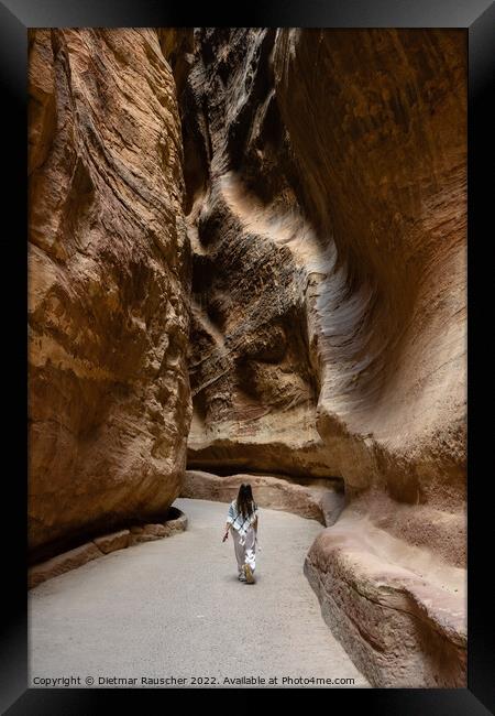 The Siq Gorge in the Nabatean City Petra with a Girl Framed Print by Dietmar Rauscher