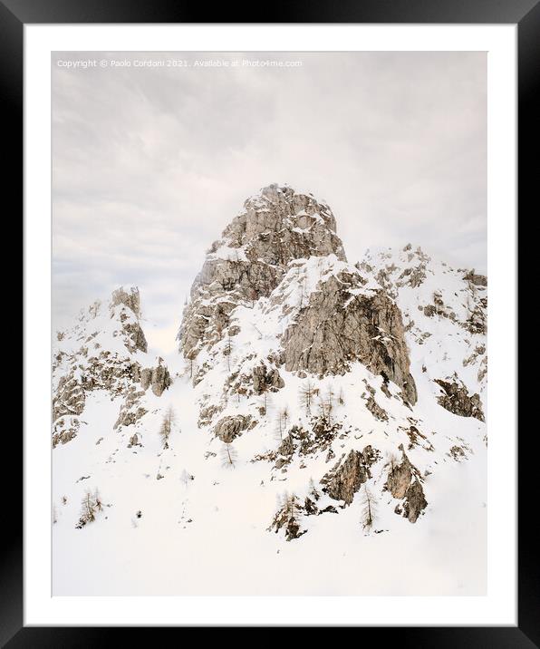 Mountain rocky peak in the snow Framed Mounted Print by Paolo Cordoni