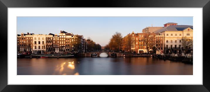 Amstel River and Architecture Amsterdam Netherlands Sunset Framed Mounted Print by Sonny Ryse