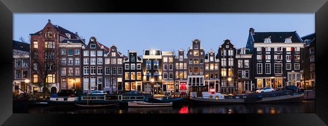 Singel Canal houses at night Amsterdam Netherlands Framed Print by Sonny Ryse