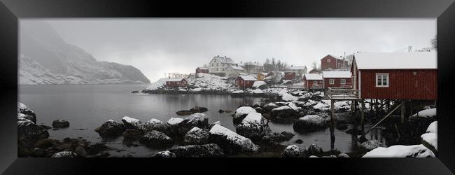 Nusfjord fishing village cabins huts covered in snow Lofoten Isl Framed Print by Sonny Ryse
