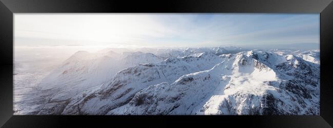 Three sisters mountains in winter snow glen coe glencoe scotland aerial Framed Print by Sonny Ryse